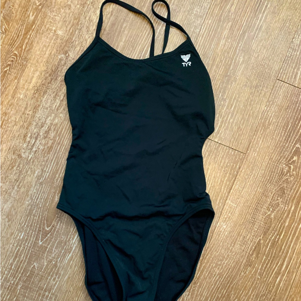 TYR Women’s black open back suit. Size 32.